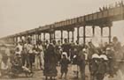 Jetty and entertainers on sands